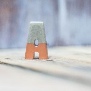 Concrete Letters Dipped in Rose